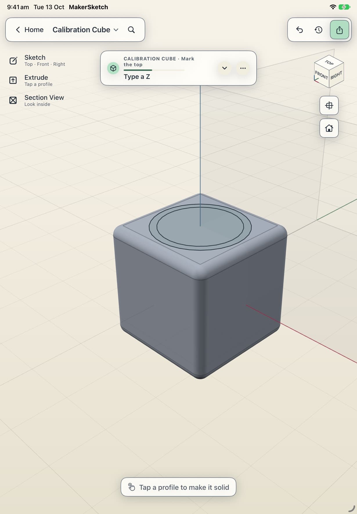 The cube with every edge rounded and a ring sketched on its top face.